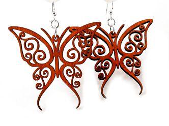 Butterfly-shaped earrings with intricate designs on a white background