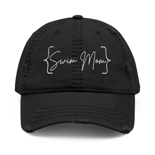 Black cap with 'Swim Mom' text on a white background